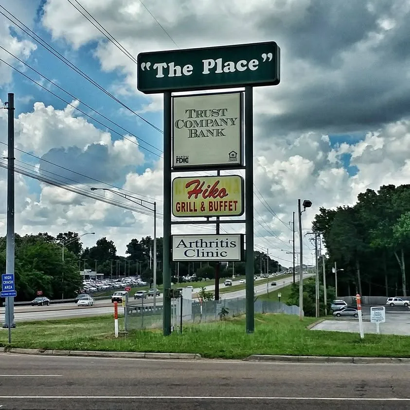 Roadside sign reading 'The Place' in Jackson, TN